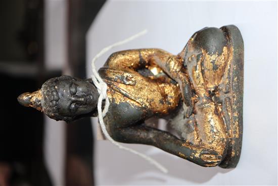 A 17th century Chinese gilded bronze Buddha H.10.5cm